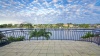 stock-photo-balcony-views-from-waterfront-mansion-overlooking-the-canal-43273042