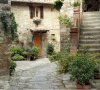 stock-photo-beautiful-courtyard-in-tuscan-medieval-village-montefioralle-near-greve-in-chianti-sometimes-8868035