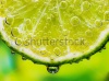 stock-photo-close-up-of-a-lemon-slice-with-bubbles-65856742