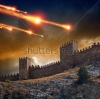 stock-photo-dramatic-background-old-fortress-tower-under-attack-dark-stormy-sky-asteroid-meteorite-impact-133805306