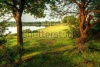 stock-photo-fairytale-style-image-of-forest-scene-with-lake-and-trees-during-vibrant-sunset-79213534