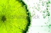 stock-photo-green-lime-with-water-splash-isolated-on-white-background-207935170