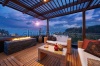 stock-photo-interior-design-beautiful-modern-terrace-lounge-with-pergola-at-sunset-151209317