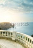 stock-photo-kind-on-sea-from-a-stone-balcony-139519838