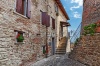 stock-photo-old-cobbled-street-in-italy-234093658