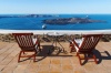 stock-photo-sea-view-from-a-terrace-of-fira-santorini-aegean-islands-greece-244150063