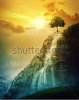 waterfalls_stock-photo-a-single-tree-on-top-of-a-mountain-with-a-waterfall-242233297