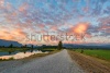 stock-photo-amazing-clouds-above-gravel-path-153123320