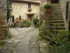 stock-photo--cute-courtyard-in-montefioralle-village-sometimes-claimed-to-be-the-birthplace-of-amerigo-38058094