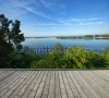 stock-photo-empty-wooden-terrace-with-top-view-of-beautiful-lake-in-the-background-196192328