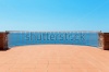stock-photo-exterior-with-sea-view-from-terrace-233111698