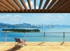 stock-photo-large-terrace-with-loungers-and-beautiful-sea-views-241101745