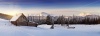 stock-photo-panorama-of-winter-mountains-with-houses-of-shepherds-carpathians-ukraine-europe-164234876
