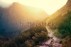 stock-photo-path-in-beautiful-mountains-at-sundown-nature-conceptual-image-228046966