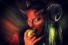 stock-photo-portrait-of-a-devil-with-horns-holding-apple-devilish-temptation-fantasy-art-project-213242362