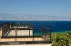 stock-photo-roof-terrace-with-great-panoramic-view-of-sicily-and-strait-of-messina-153676244