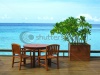 stock-photo-table-and-chairs-at-seaside-17903020