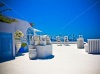 stock-photo-white-roof-of-houses-in-santorini-with-amazing-seascape-120525514