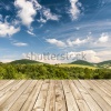 stock-photo-wood-terrace-and-perspective-view-on-forest-hills-247309627